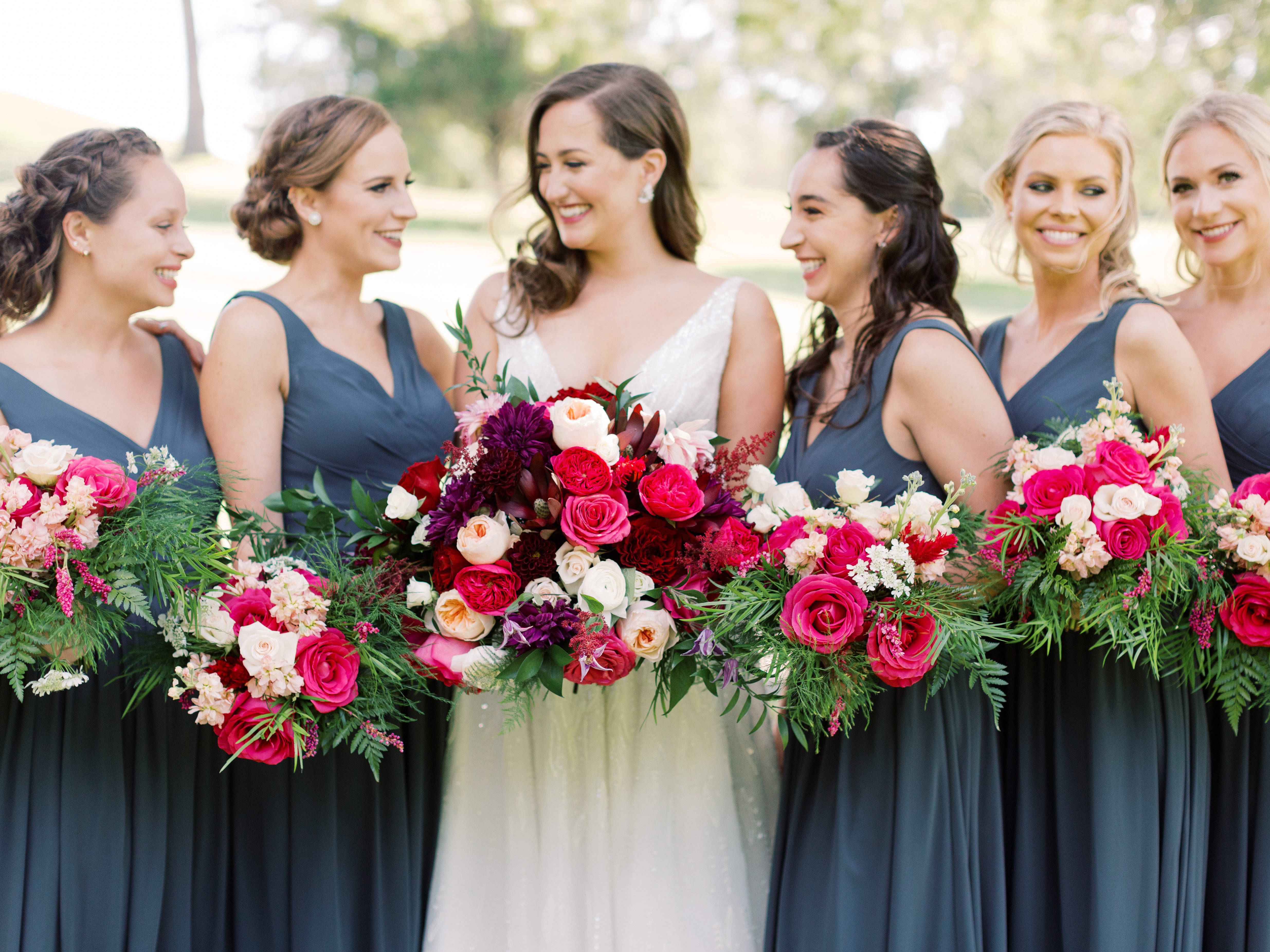 bridal party flowers with contrasting bridal bouquet